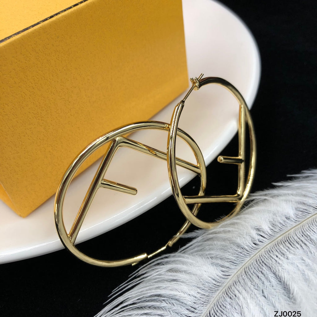 F gold earrings